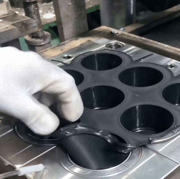 Silicone cup sleeve molding